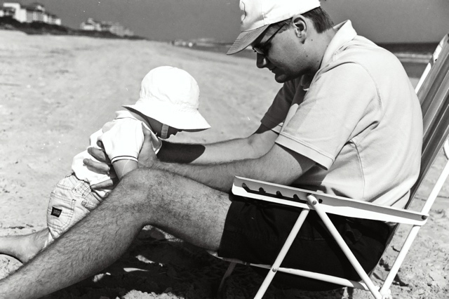 Daddy and I like to play in the sand.